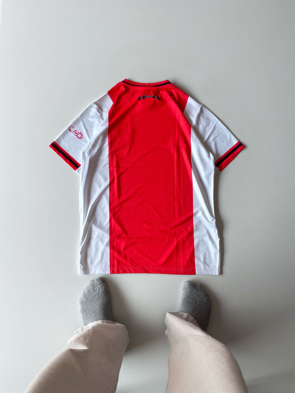Back view of the Ajax Amsterdam 2024 2025 premium football jersey showcasing Eredivisie font layout at vamstore India.